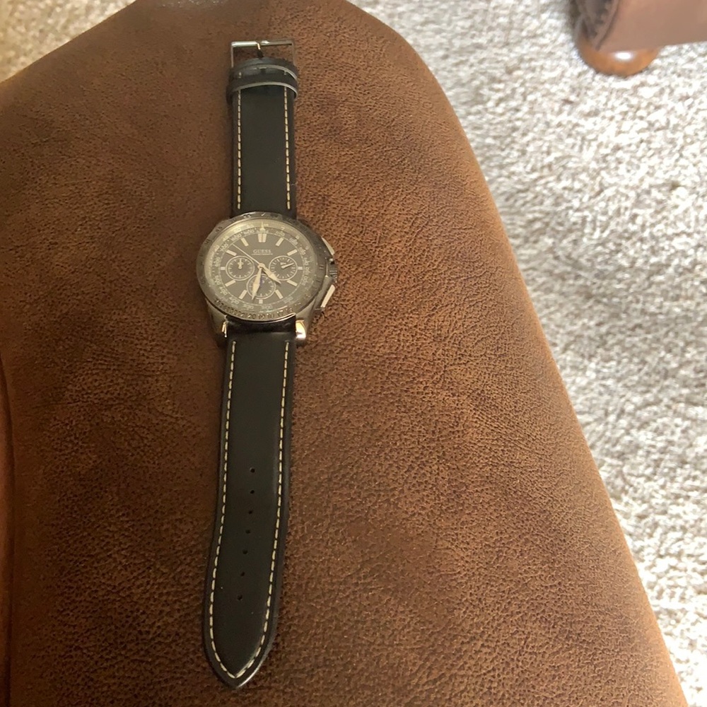 Men’s black Guess watch